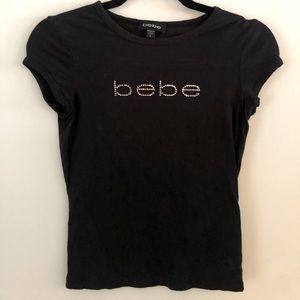 BEBE Woman’s Short Sleeve Black Top /  Shirt size small made in USA